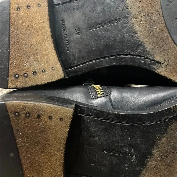 Alexander McQueen Black and Gold Ankle Boots with Sleek Design