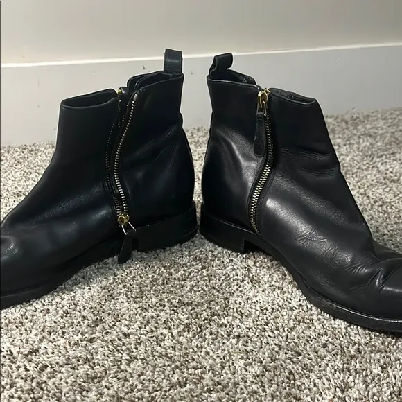 Alexander McQueen Black and Gold Ankle Boots with Sleek Design