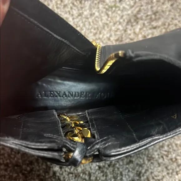 Alexander McQueen Black and Gold Ankle Boots with Sleek Design