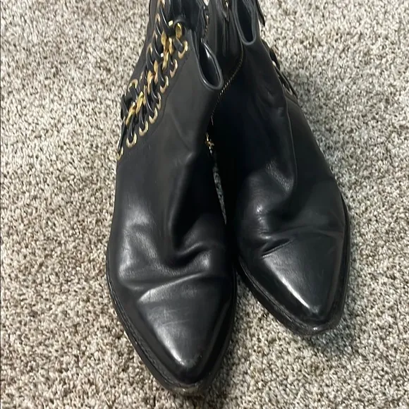 Alexander McQueen Black and Gold Ankle Boots with Sleek Design