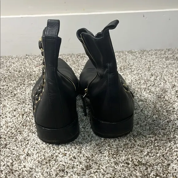 Alexander McQueen Black and Gold Ankle Boots with Sleek Design