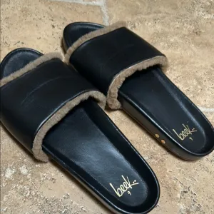 Beek Black and Tan Women's Slides