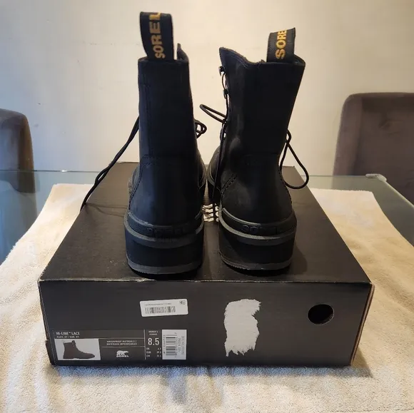 Black Leather Combat Boots with Lace-Up Design