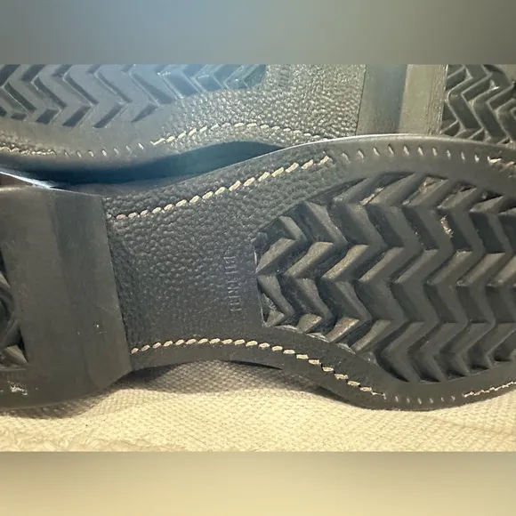 Black Leather High-Top Boots with Rugged Design