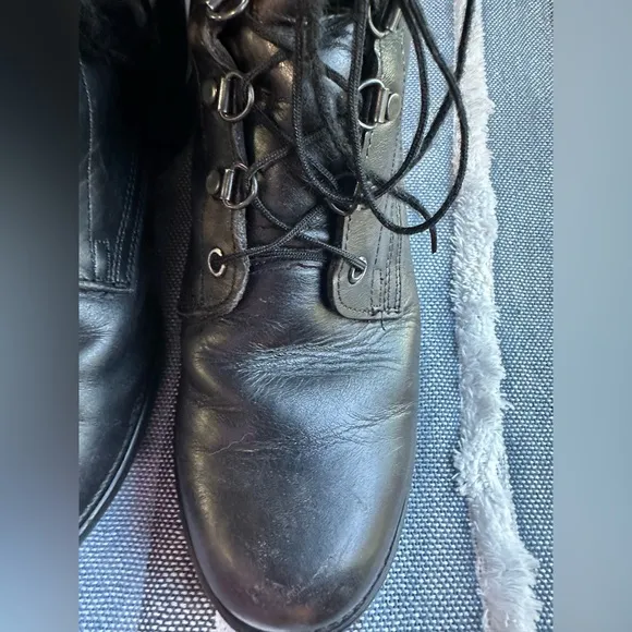 Black Leather High-Top Boots with Rugged Design