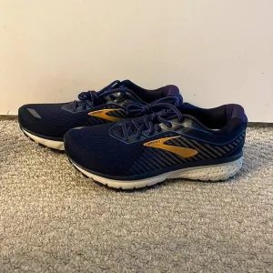 Brooks Ghost 12 shoes. Men’s size 8-4E Wide. Color navy blue and gold