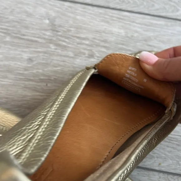 Coach Nicola gold metallic leather flat penny loafers style slip on shoes size 8