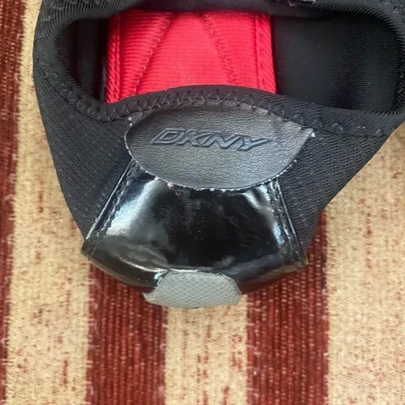 DKNY black athletic slip on shoes with toggle closure. Worn twice 8.5