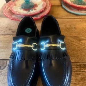 Dr. Martens Black and Gold Loafers