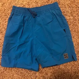 Essential Men's 7&quot; Swim Trunks In Photo Blue