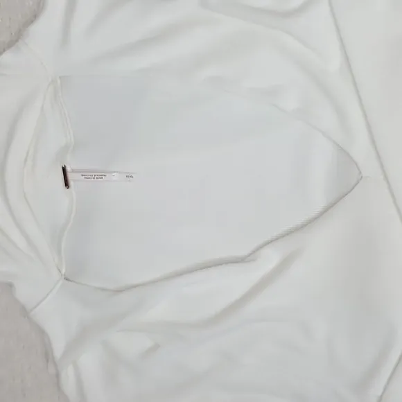 Free People Uptown Long Sleeve Cut Out Turtleneck Sweater Top in Ivory - NWT