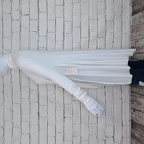 Free People Uptown Long Sleeve Cut Out Turtleneck Sweater Top in Ivory - NWT