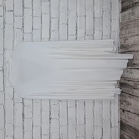Free People Uptown Long Sleeve Cut Out Turtleneck Sweater Top in Ivory - NWT