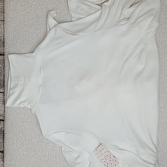 Free People Uptown Long Sleeve Cut Out Turtleneck Sweater Top in Ivory - NWT