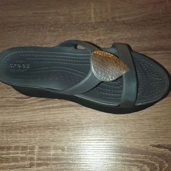 NEW Crocs slides size 9 with 2 inch orthopedic elevation under left foot only.