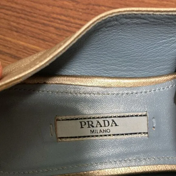 Prada Etiquette Metallic Gold Leather Loafer. Size 37.