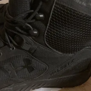 Under Armour man boots size 10.5