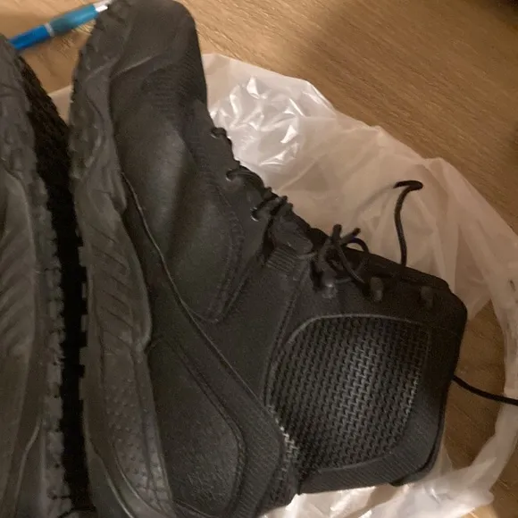 Under Armour man boots size 10.5