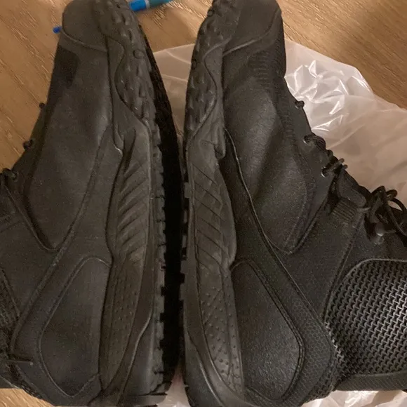 Under Armour man boots size 10.5