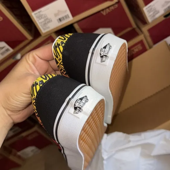 Vans Black Slip-On Shoes with Multicolor Pattern