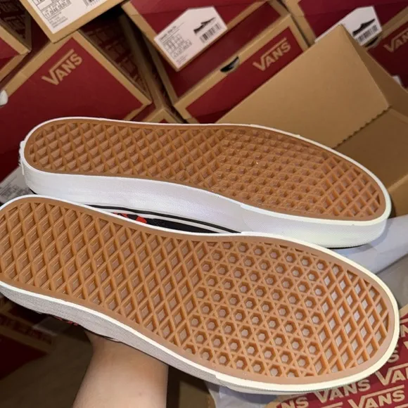 Vans Black Slip-On Shoes with Multicolor Pattern