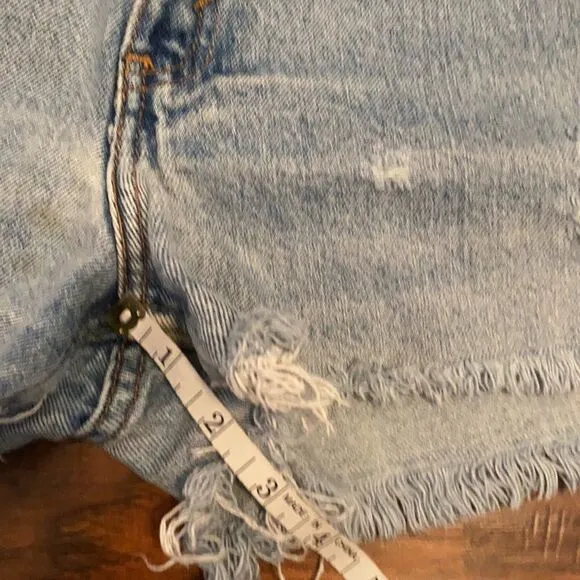 Vintage Levi’s Blue Denim Distressed Man Made Cutoff Raw Hem Shorts Casual