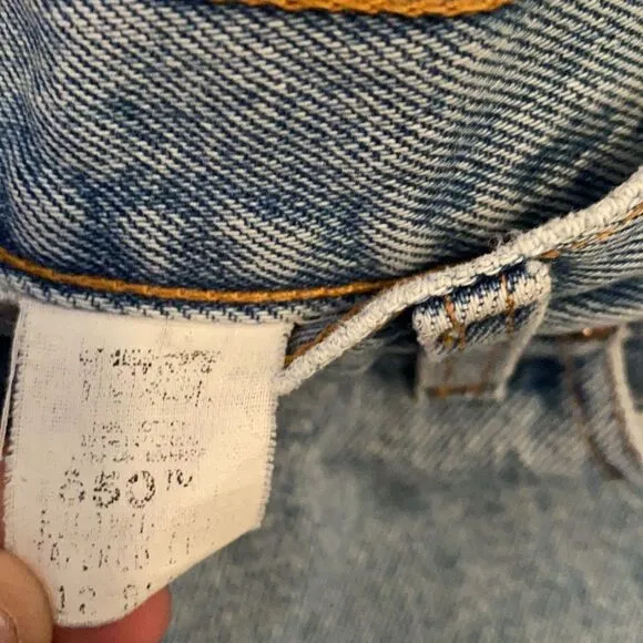 Vintage Levi’s Blue Denim Distressed Man Made Cutoff Raw Hem Shorts Casual
