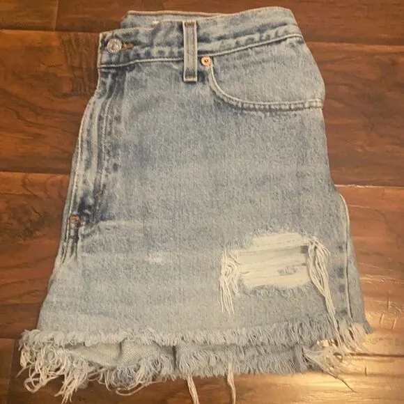 Vintage Levi’s Blue Denim Distressed Man Made Cutoff Raw Hem Shorts Casual