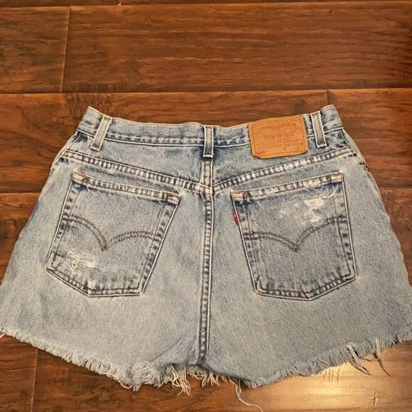 Vintage Levi’s Blue Denim Distressed Man Made Cutoff Raw Hem Shorts Casual